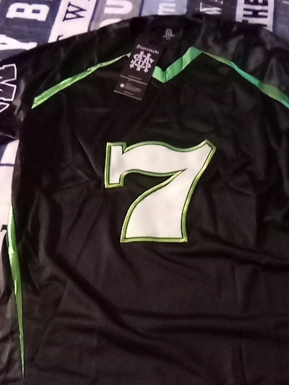 Men's Black Athletic Jersey Shirt with White Number 7 and Green Trim